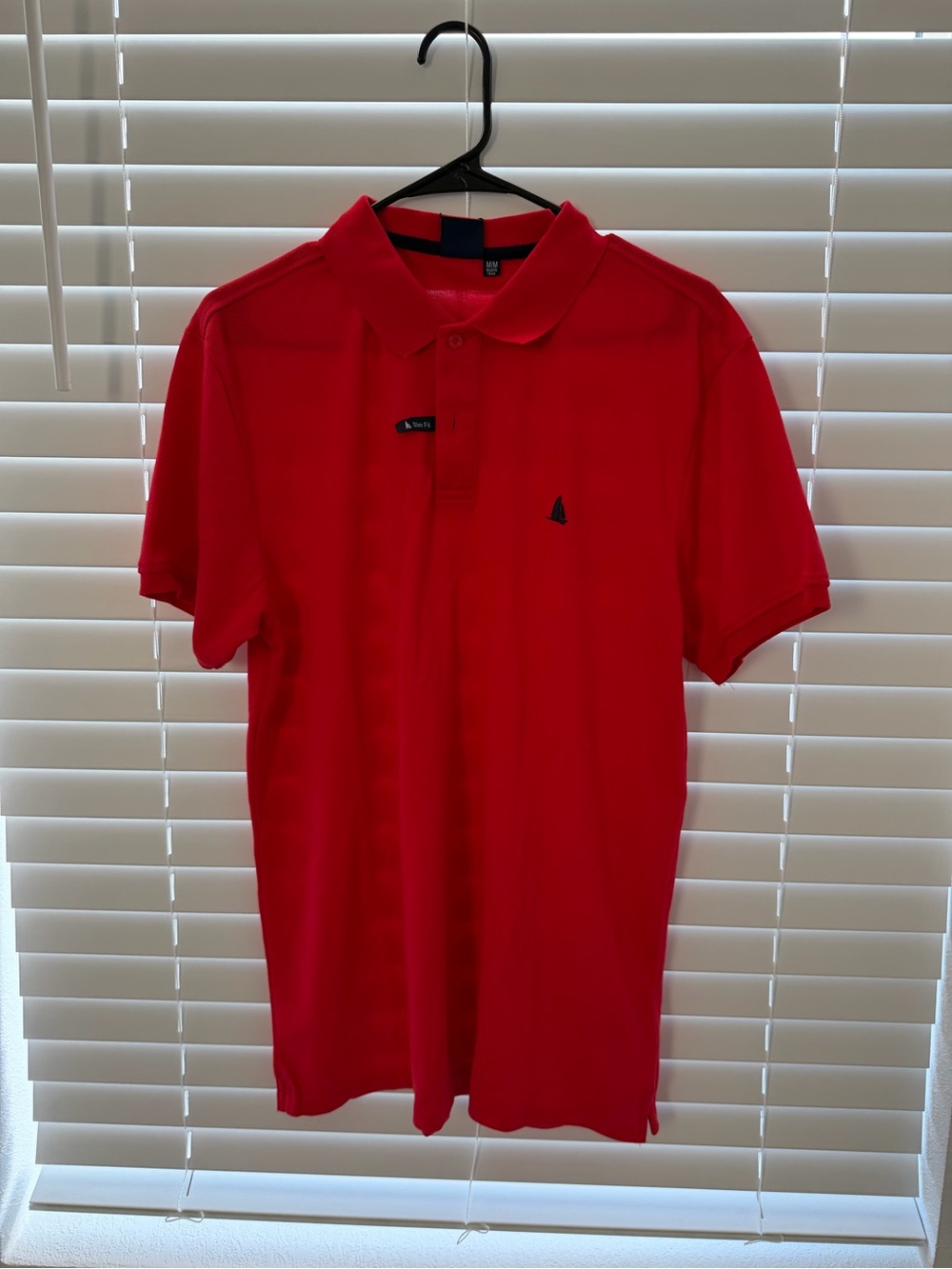 Men's Red Polo with Subtle Chest Emblem